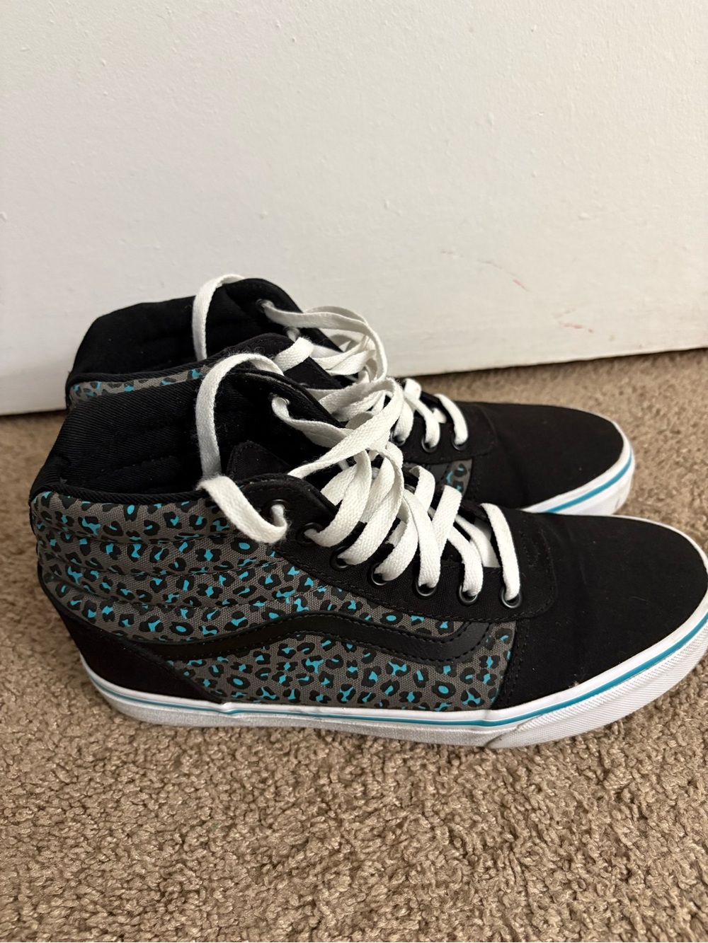 High-Top Women's Vans Sneakers in Black with Teal Leopard Print